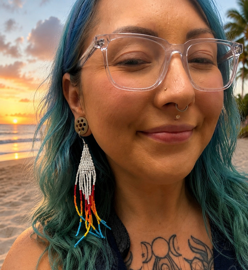 Beach Trip earrings worn at sunset on the beach