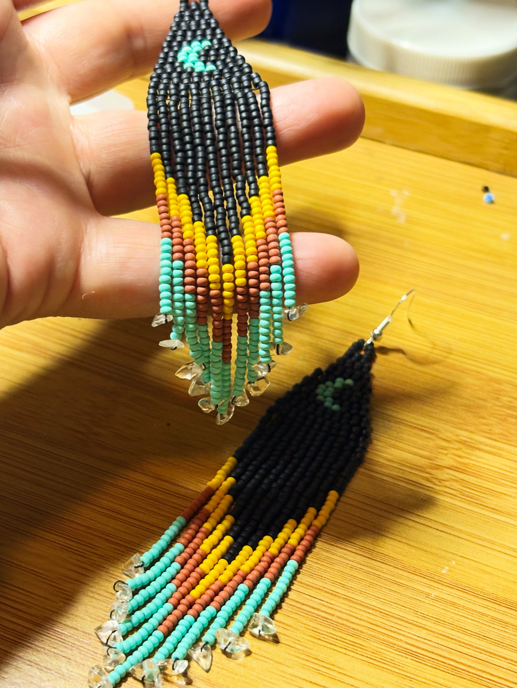 Close up detail of Red Road Moonrise earring showing quartz crystal tips