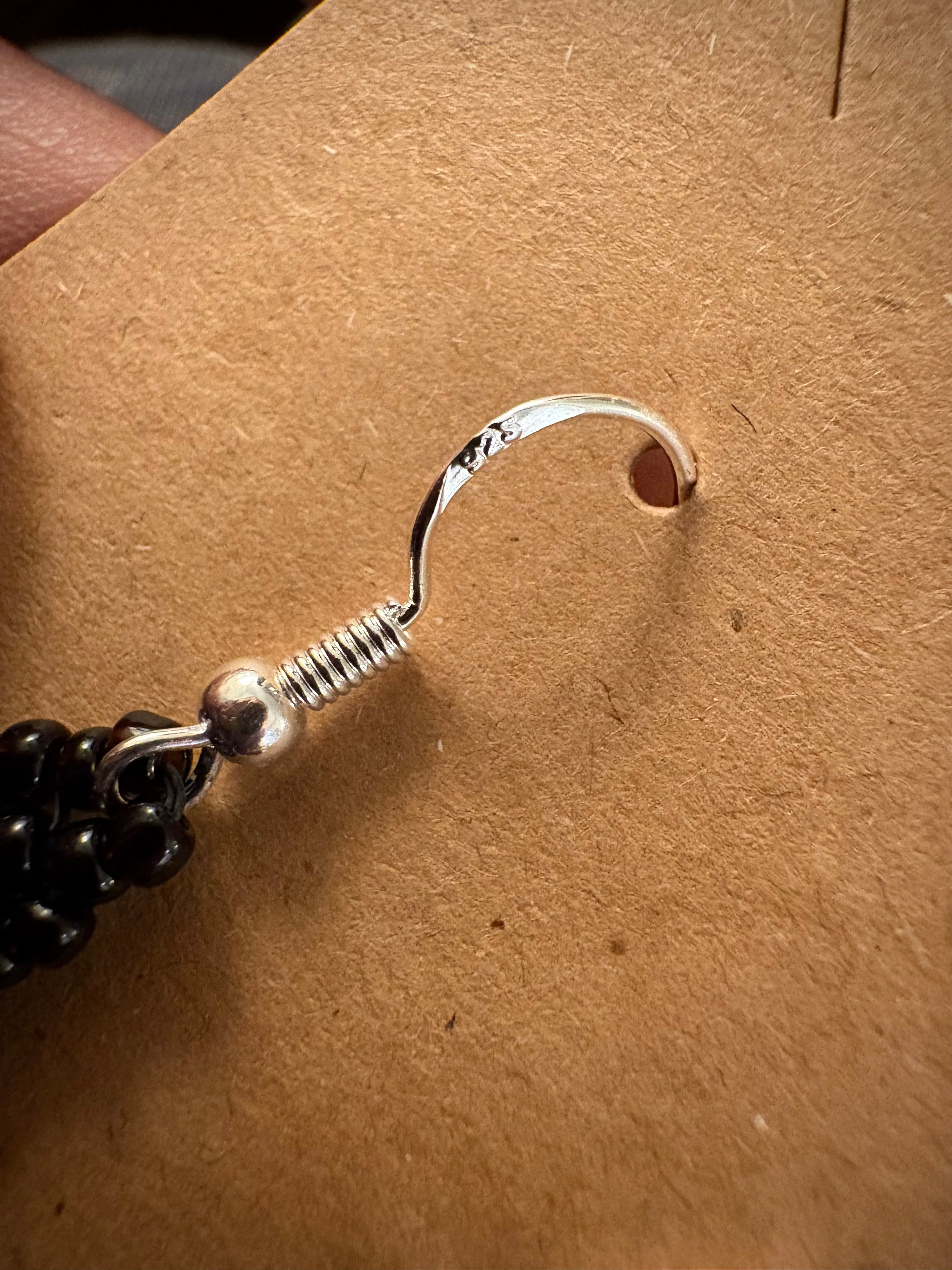 Close up of sterling silver ear hook on Summer Nights earrings