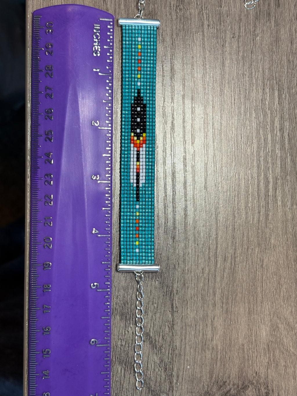 Spirit Bird beaded bracelet with size reference